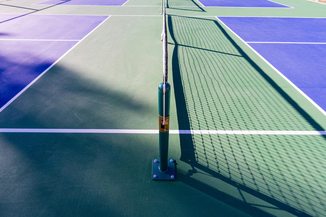 The Impact of Court Surface on Pickleball Play: Indoor vs. Outdoor Dynamics