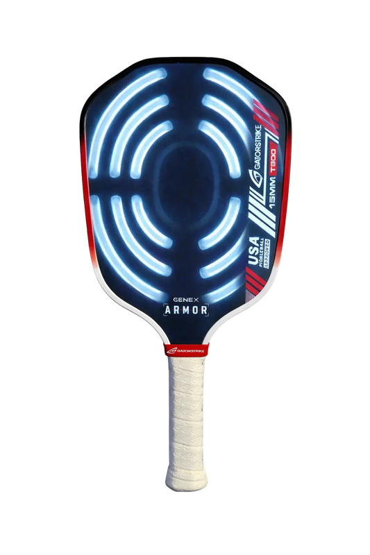 A pickleball paddle with a white grip, black and red edges, and blue glowing concentric circles on the face. The paddle has logos, including GENEX ARMOR and USA. The design appears modern and high-tech.