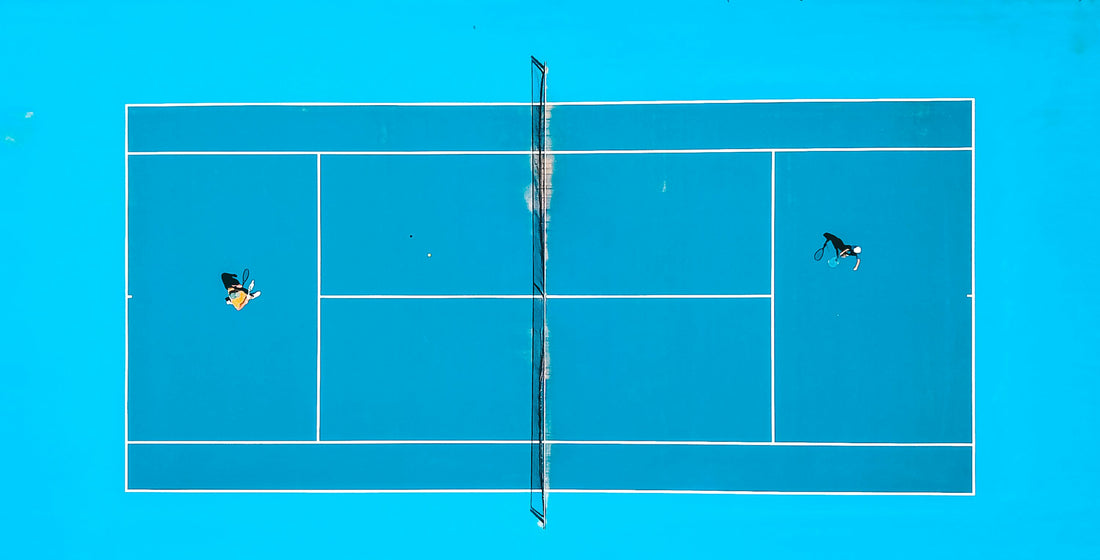 Aerial view of two players on a pickleball court