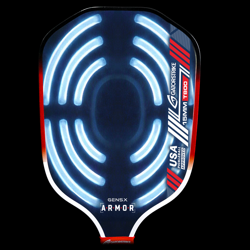 A black pickleball paddle with glowing blue lines forming semi-circles. The right side features red and blue stripes, “USA Pickleball Approved,” and “GENS X ARMOR.” The brand “GAMMA” and model “T800” are also displayed.