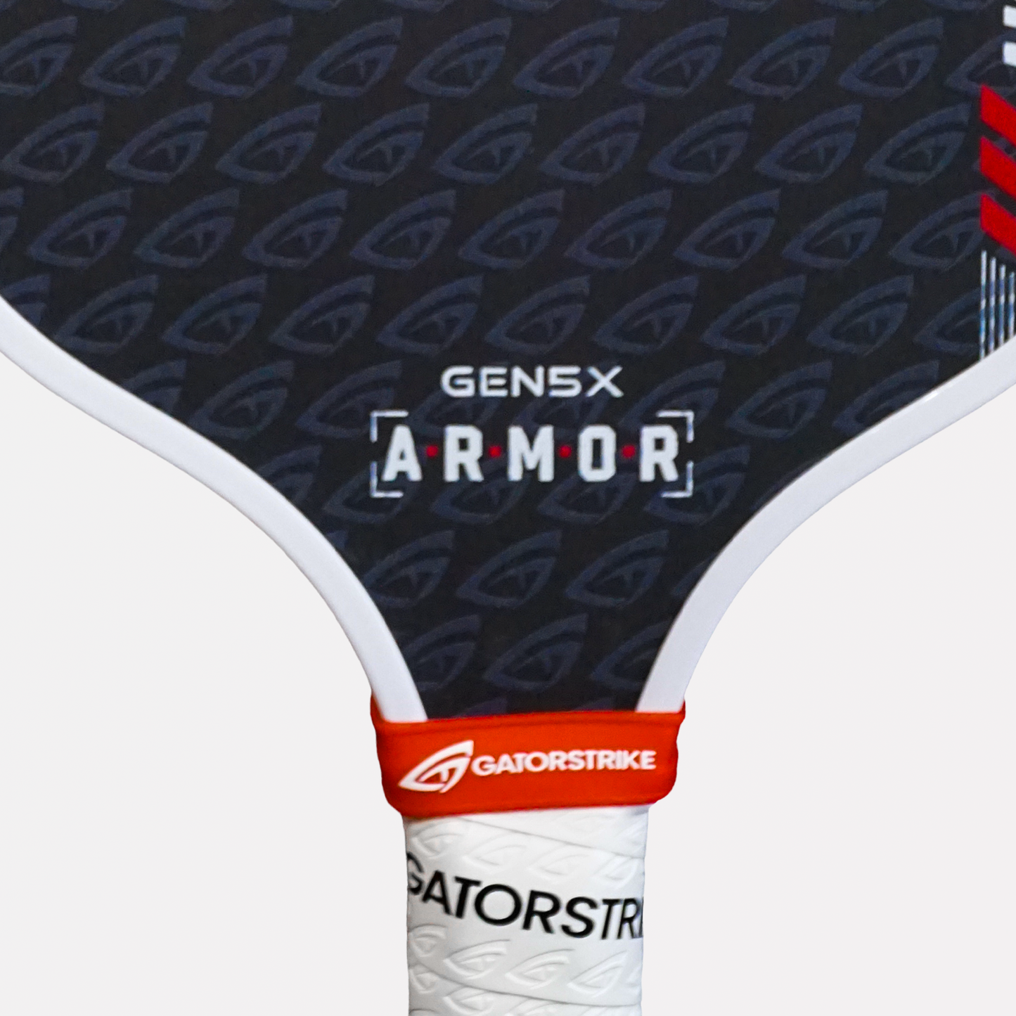 Close-up of a GEN5X ARMOR pickleball paddle, designed for competitive players and aggressive drives, with a red accent.