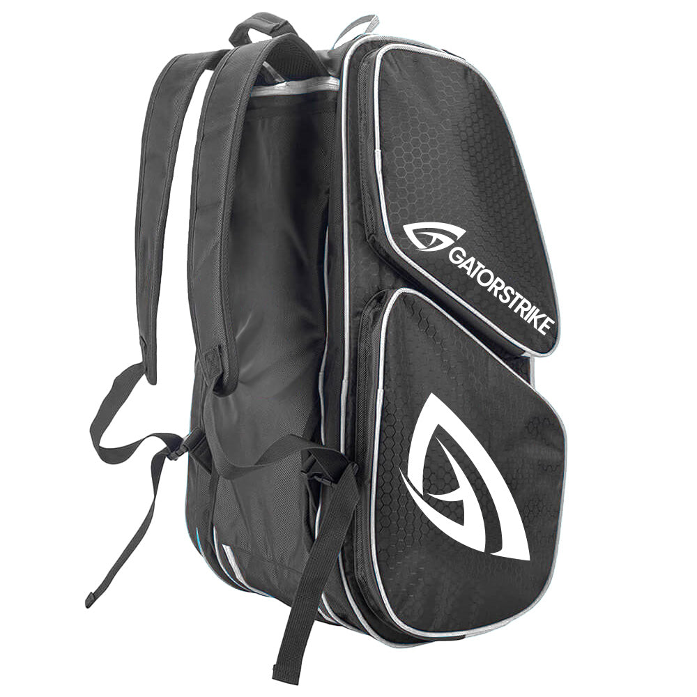 The black GATORSTRIKE sports backpack features a hexagonal pattern, fits wide-body or elongated paddles, has two large zippered compartments, padded shoulder straps, white trim, and bold white GATORSTRIKE logos.