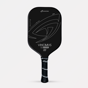 Black GatorStrike Vincimus pickleball paddle with explosive pop, bold silver logo, and patterned handle on a white background.