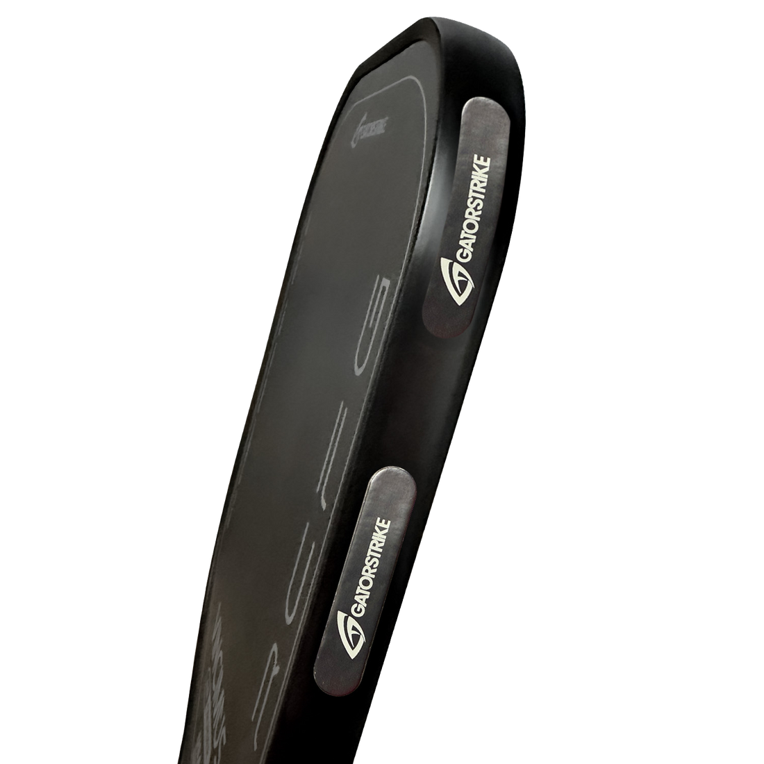 A close-up side view of a black rectangular kicking pad with rounded edges, featuring the brand name “GATORSTRIKE” and logo in white. Its smooth synthetic leather surface offers a quality feel, like a premium pickleball accessory.