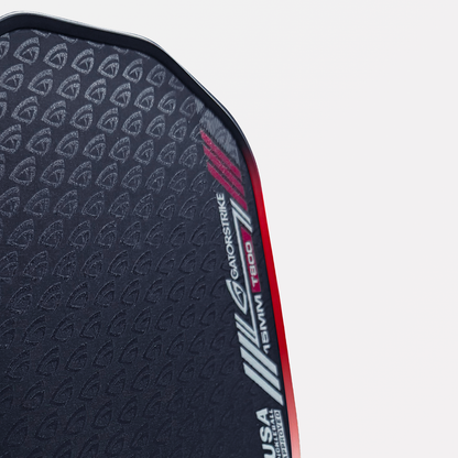 Close-up of a black and red textured shield labeled GAIORSTRIKE MILC 15MM T800 USA, ideal for aggressive drives.