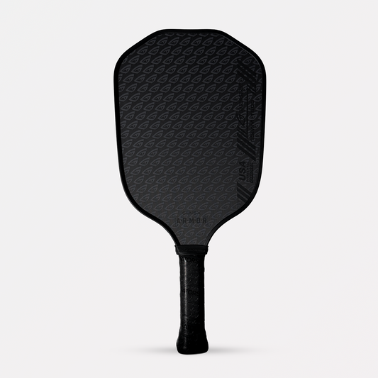 A blackout-style GatorStrike A.R.M.O.R Gen 5x pickleball paddle with stealth matte finish and white grip, built for power and control.