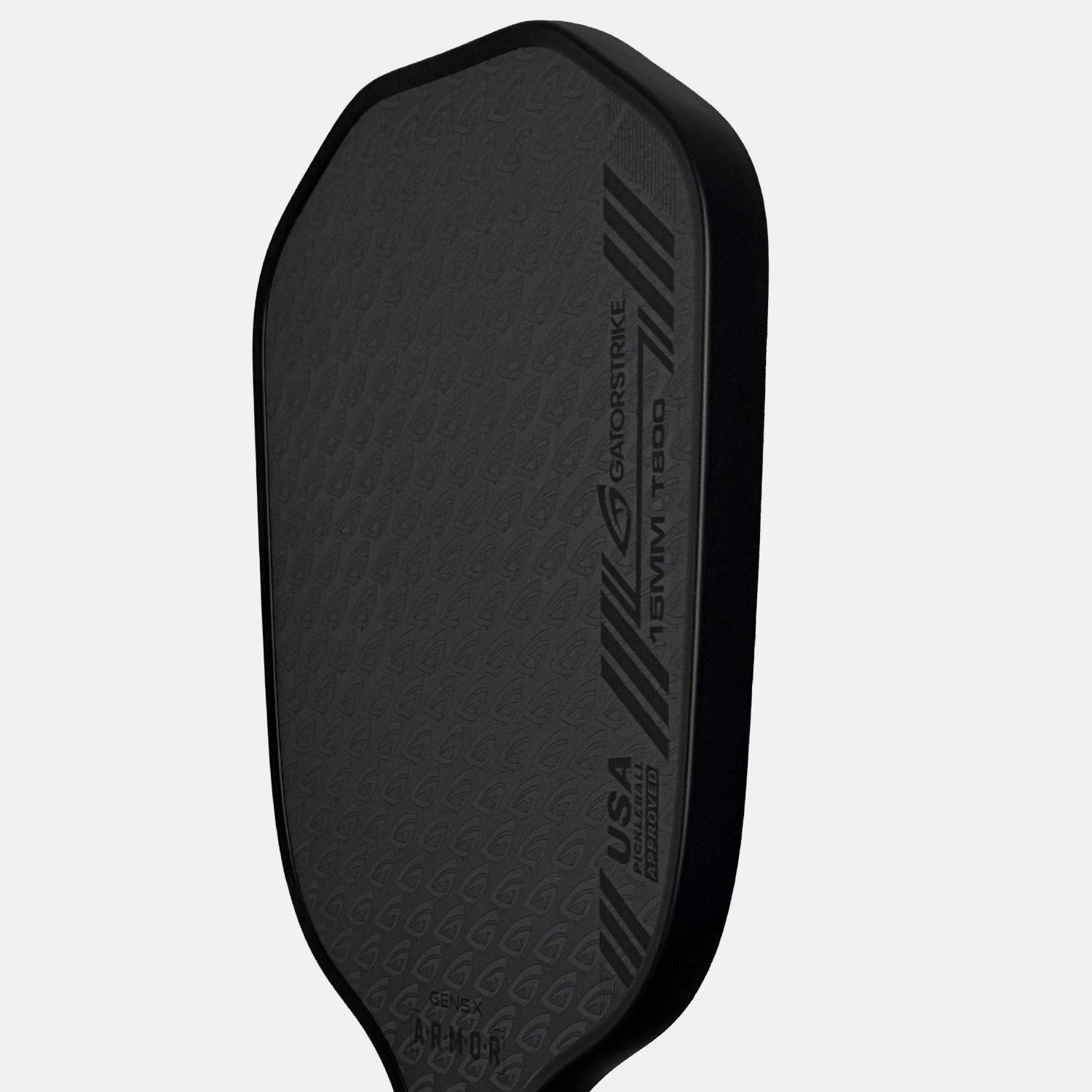 Close-up of a dark gray Gatorstrike pickleball paddle, textured surface, slanted stripes, and meets official pickleball rules.