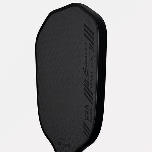 Close-up of a dark gray Gatorstrike pickleball paddle, textured surface, slanted stripes, and meets official pickleball rules.
