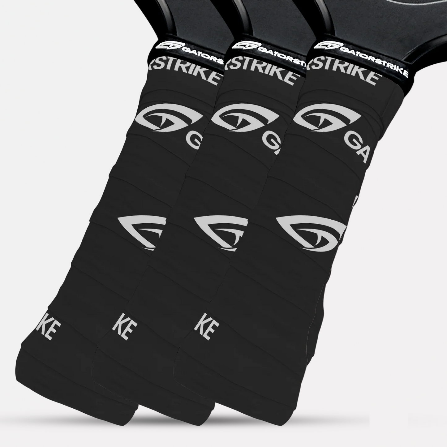 Three black GatorStrike-branded handles are shown side by side, featuring non-slip grip for superior sweat management.